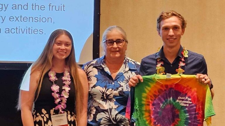 Patrick Veazie accepted the Chad Finn Ambassador Award on behalf of Dr Perkins Veazie at the 2024 ASHS conference From left to right Brianna Haynes Gina Fernandez and Patrick Veazie