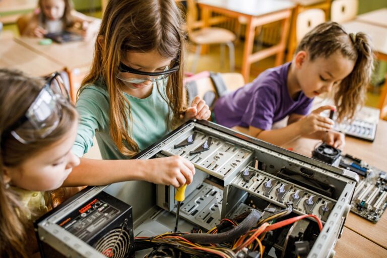 schoolchildren working on computer